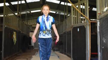 Tamryn Matheson with her medals from the 2024 Country Championships and Winter Invitational. Picture by Angus Michie