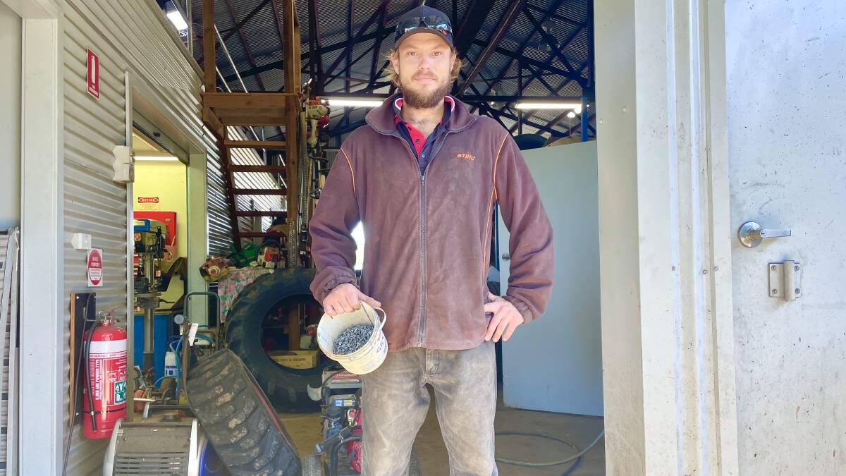 Dungog Tyre Service's Aaron Palmer removes up to 15 screws a day from car tyres. Picture by Angus Michie