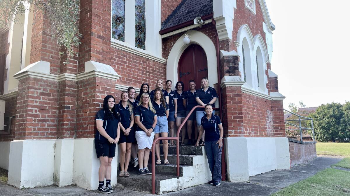 The Dungog Community Preschool team outside the historic church. Picture Angus Michie.
