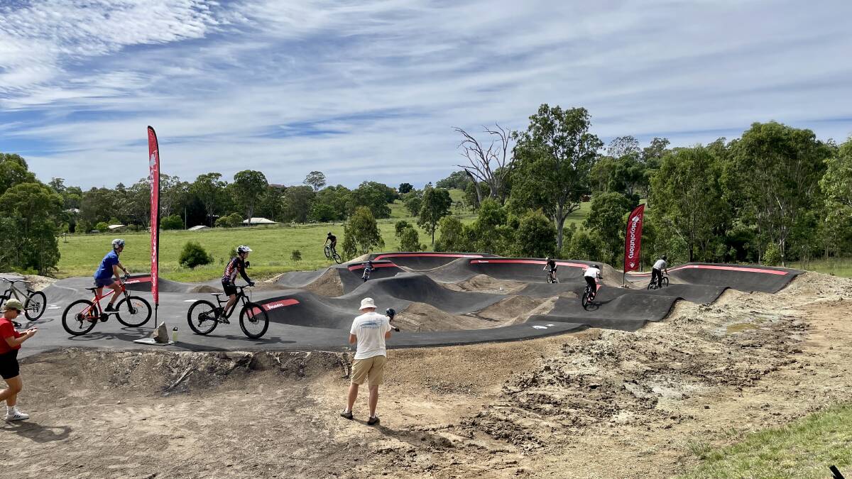 Riders on the Dungog Common's new pump track. Picture by Angus Michie