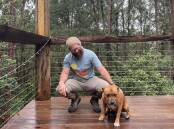 Dan Lyons and his dog Leon at Wangat Lodge. Picture by Angus Michie