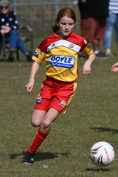 A young girl showing off Gresford Vacy Football Club's new jersey. Picture supplied